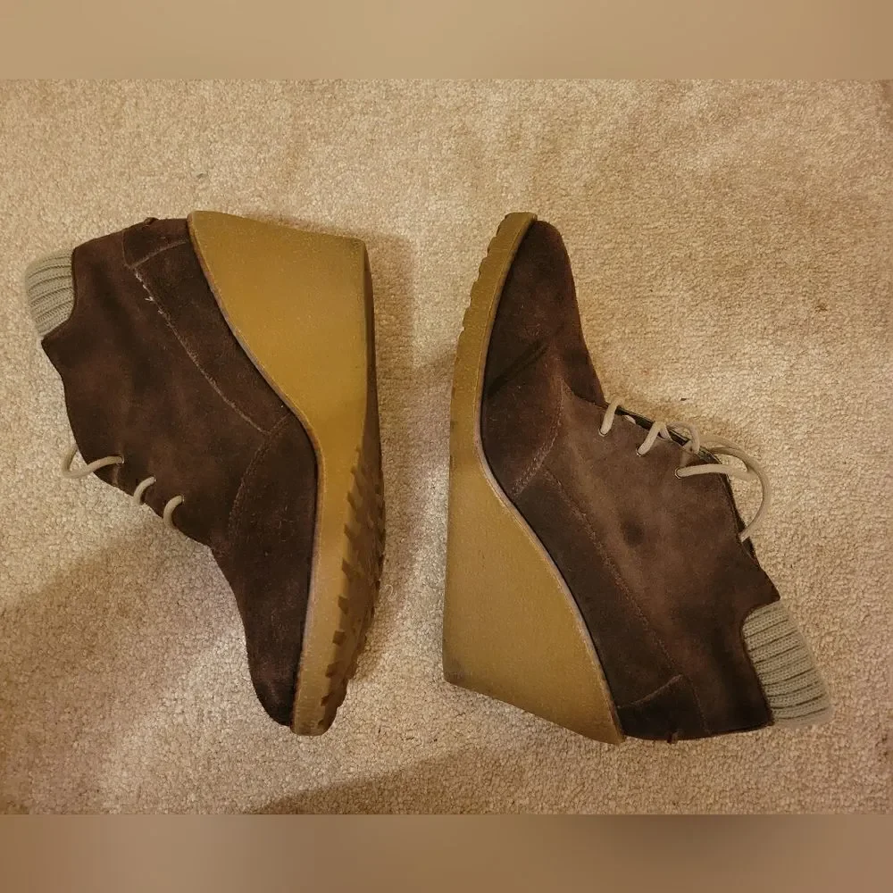 Lacoste suede wedge boot.